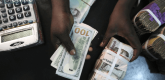 Naira rises, trades below N1,000 per dollar at black market