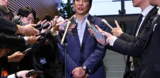 Japanese minister resigns for saying he gets free rice
